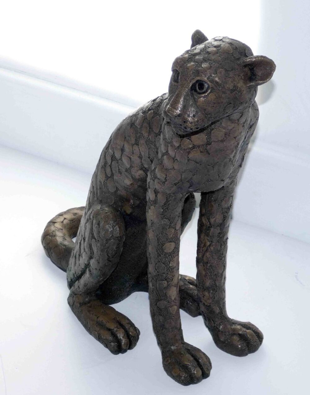 Libby Edmondson Bronze Resin ‘Sitting Cheetah head up’